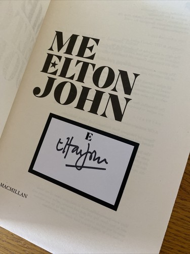 Elton john signed book - john,