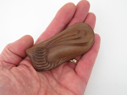 Exquisite carved walnut treen