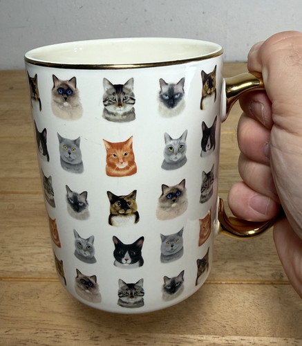 Gold handled mug tale of - handled,