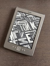 Early Edition Kindle with Side Buttons, none touch screen