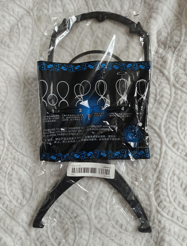 Black plastic wig display - plastic,