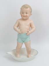 GEBRUDER HEUBACH BISQUE BOY IN A BATH FIGURINE C.1900