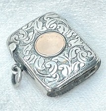 VICTORIAN STERLING SILVER VESTA CASE WITH 9ct GOLD PLAQUE- B'ham, 1900.