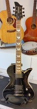 Fernandes Ravelle Deluxe Baritone/2 x EMG81/Gotoh hardware. Excellent condition.