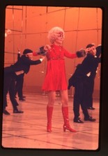 Anne Bancroft dancing in red