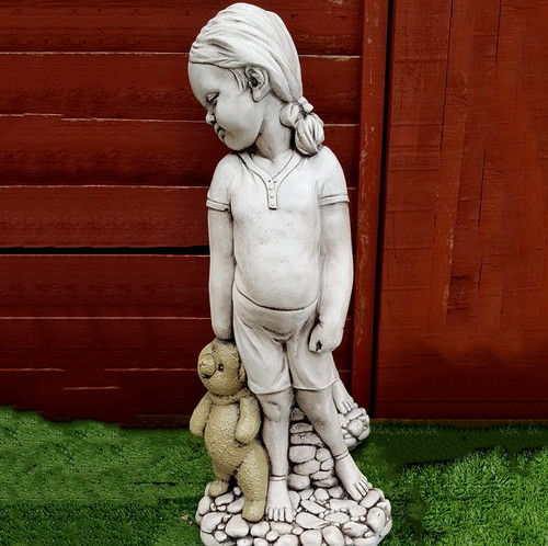 Girl with teddy bear concrete - with,
