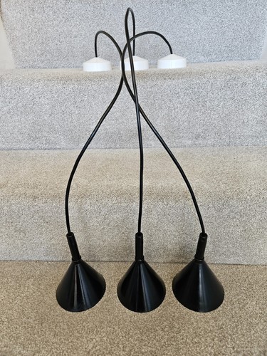 Three pendant lights hang - lights,