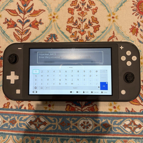 Nintendo switch lite grey - nintendo,
