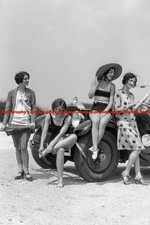 F000459 1920s GROUP OF FOUR WOMEN IN DRESSES and BATHING SUITS