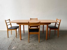 1960’s Mid-Century extending dining table with 4 dining chairs by Schreiber