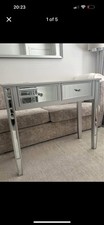 Venetian mirrored console table