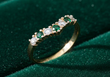 18ct Gold Emerald Wishbone