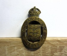 Antique WW1 On War Service 1915 BADGE - no M 12077 by J.R Gaunt & Son
