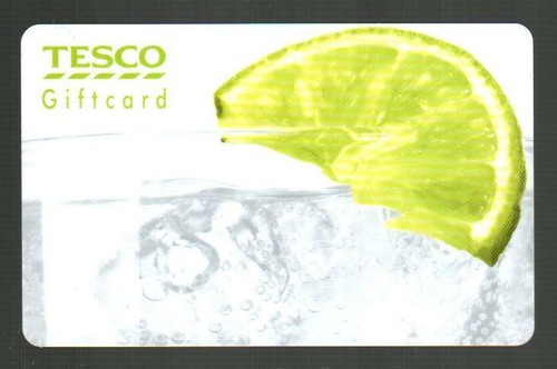 Tesco drink with slice - ),
