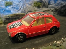 MC Toy Peugeot 205 GTI in red