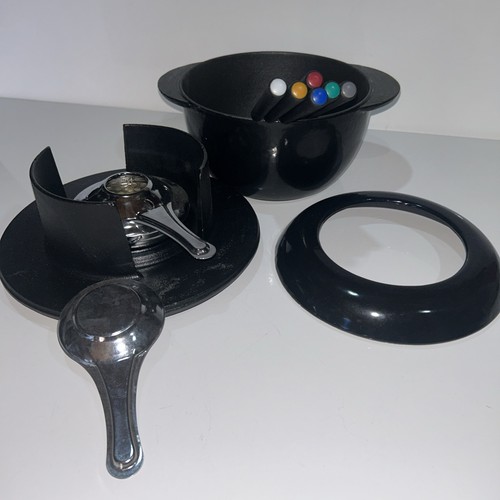 Used heavy cast iron fondue - un,