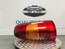 GENUINE 1994-2001 NISSAN VANETTE CARGO OSR REAR DRIVER RIGHT LIGHT