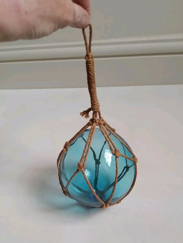 Blue rope covered glass - covered,