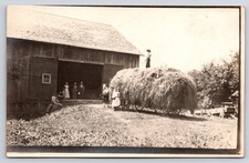 RPPC Horse-Drawn Hay Wagon at Barn – Early Farm Scene