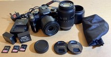 Panasonic LUMIX G2 with 14-42mm and 45-200mm mega o.i.s  Panasonic lenses.