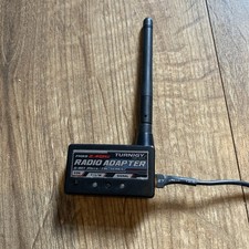 Turnigy FHSS 2.4GHz Radio Adapter. It Is A Transmitter Module for RC Helicopter