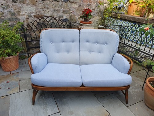 Ercol two seater sofa - , covered