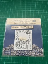 Tattered lace melded through the window metal cutting die