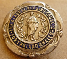 VINTAGE ENAMEL BADGE GENERAL