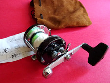 A VERY GOOD LIGHTLY USED ABU GARCIA AMBASSADEUR 6500 CT ROCKET + POUCH