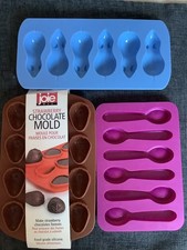 Chocolate mice , spoons , strawberries silicone moulds