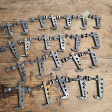 Vintage metal adjuster clamps