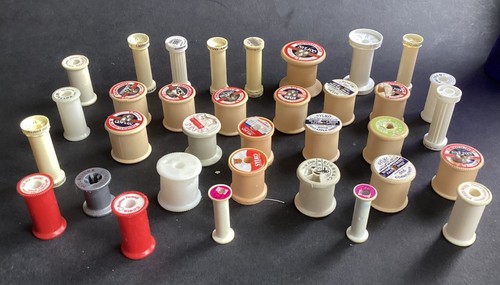 Plastic cotton reels - 34,