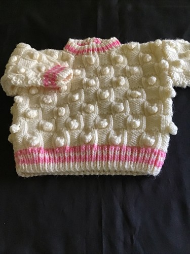 Hand knitted aran - hand, sweater