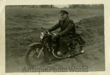 Soviet soldier on motorcycle