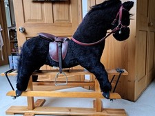 Black Rocking Horse With Saddle, reins & stirrups On Wooden Frame