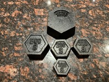 SET OF VINTAGE METRIC CAST IRON HEXAGON SCALE WEIGHTS.1 KG , 500g ,2 X200g ,100g