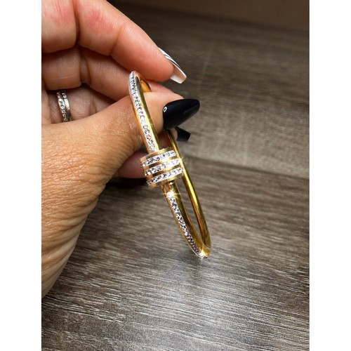 Gold nail bracelet with - nail,