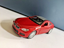 MAISTO  BMW M6 1:42 scale metallic red