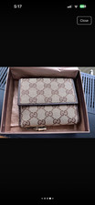 gucci wallet used once Price