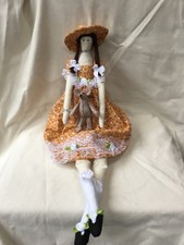 handmade Tilda dolls holding handmade mouse