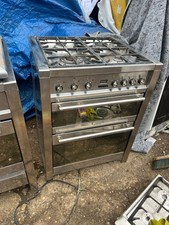 Smeg free-standing cooker with dual fuel (gas hob + electric oven) configuration