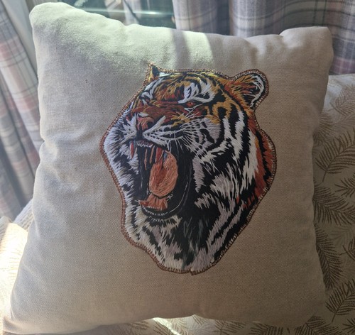 Hand embroidered tiger - hand,
