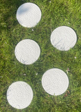 Five hand cast circular white