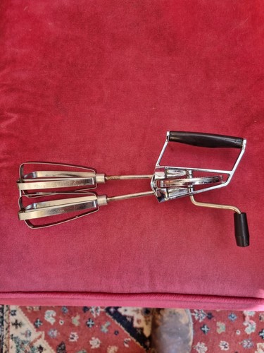 Vintage skyline hand whisk - hand,