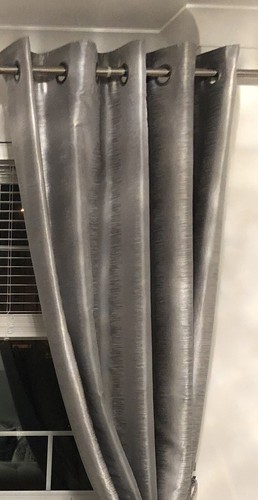 Silver eyelet curtains next