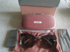 Miu Miu silver frame cat's eye