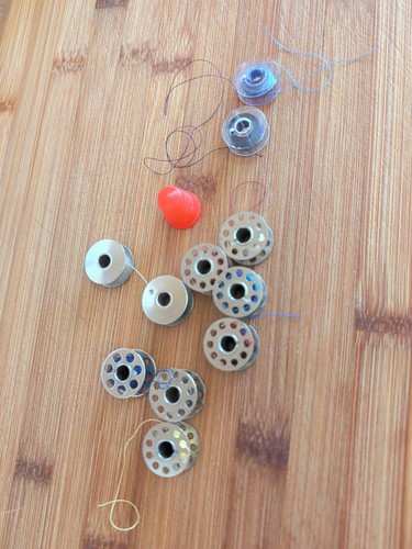 Lot old bobbins with - old,