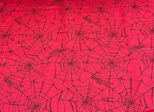 Spiderwebs on Red Fabric by