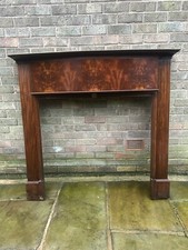 Mahogany flame fire surround (1920s/ 1930s); good condition.