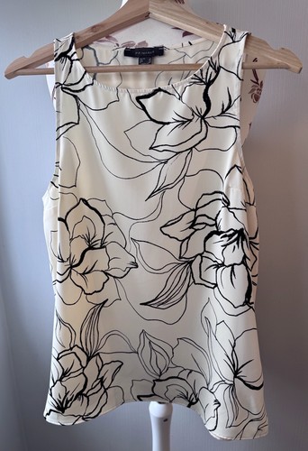 Sleeveless cream and black - sleeveless,